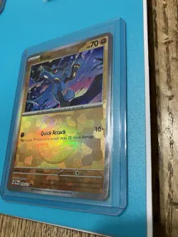 Pokemon TCG Prismatic Evolutions Riolu Card 050/131 Master Ball Reverse Holo - Image 3