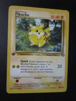 PIKACHU POKEMON CARD 1ST EDITION 60/64 JUNGLE NON HOLO NEVER PLAYED NM - Image 1