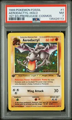 1999 POKEMON FOSSIL 1ST ED-PRERELEASE-COSMOS #1 AERODACTYL-HOLO PSA 7 - Image 1