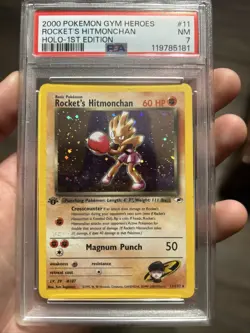 Rockets Hitmonchan 1st Edition Gym Heroes Trading Card 11/132 PSA 7 With Swirl - Image 1
