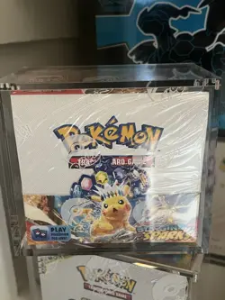 Pokemon TCG: Surging Sparks Factory Sealed Booster Box With Acrylic Case - Image 1