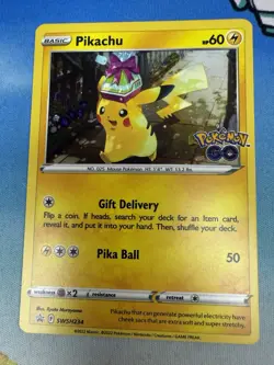 Pikachu SWSH234 Pokemon Go Black Star Promo Cosmos Holo Card - Image 1