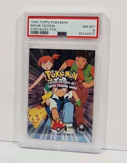 1999 Pokemon Topps Checklist Foil Movie Edition Pokemon Card Graded PSA 8 - Image 1