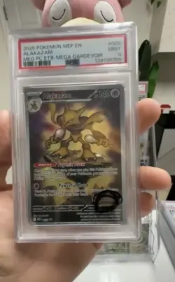 2025 POKEMON MEGA EVOLUTION POKEMON CENTER ETB PROMO #009 ALAKAZAM PSA 9 - Image 1