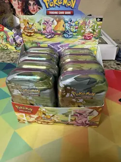 Pokemon TCG: Scarlet & Violet: Prismatic Evolutions - Mini Tin Display Set of 8 - Image 1