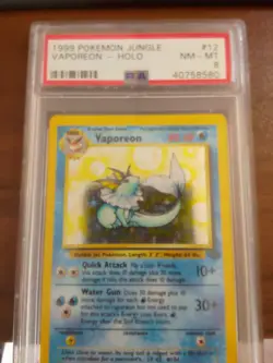 1999 POKEMON JUNGLE #12 VAPOREON-HOLO PSA 8 NM-MT - Image 1