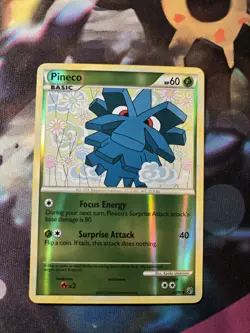 Pineco 63/90 Undaunted Reverse Holo Foil Pokemon TCG Card NM - Image 1