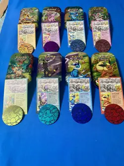Prismatic Evolutions *EMPTY* Mini Tin Complete Set Of 8 (Tin + Card + Coin) - Image 1