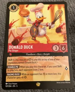 107/204 DONALD DUCK PIE SLINGER SHIMMERING SKIES LEGENDARY DISNEY LORCANA CARD. - Image 1