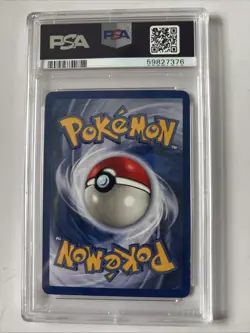 1999 Pokemon TCG Fossil 4/62 Dragonite Holo Card PSA 7 - Image 2