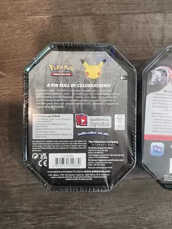 Pokemon Charizard (2 )- 4 Pack Tins Celebrations & Paldean Fates - New - Sealed - Image 4
