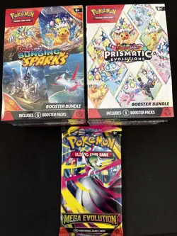 Surging Sparks & Prismatic Bundle Pokemon TCG + Mega EV Booster pack - Image 1