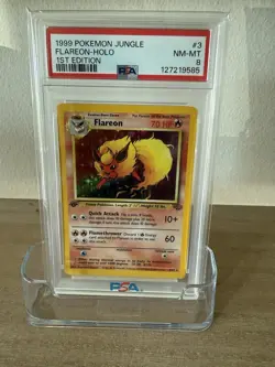 1999 POKEMON JUNGLE FLAREON-HOLO 1ST EDITION PSA 8 - Image 1