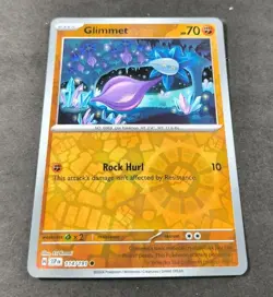 Pokemon Surging Sparks Glimmet Reverse Holo Common Card 114/191 NM - Image 1