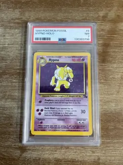 1999 POKEMON FOSSIL #8 HYPNO-HOLO PSA 7 - Image 1