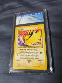 Pokemon CGC 7 Graded Card Zapdos Black Star Promo 23 Error Illustrator - Image 1