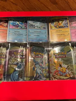 Pokemon TCG: Scarlet & Violet - Prismatic Evolutions 8 Pack Mini Tin Set - Image 5