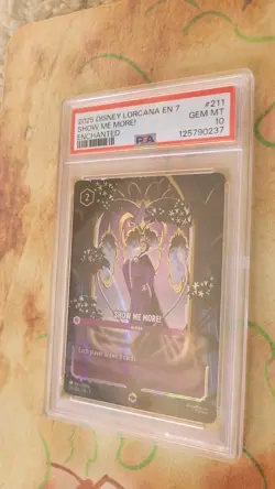 Lorcana Evil Queen Enchanted Card Show Me More! Archazia's Island 2025 PSA 10 - Image 1
