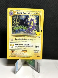 Light Toxtricity SWSH137 Celebrations Promo Pokemon Card HP/Damaged - Image 1