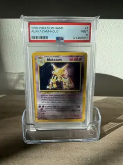 1999 POKEMON GAME ALAKAZAM-HOLO PSA 9 - Image 1