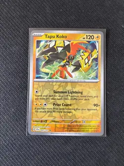 065/191 TAPU KOKO REVERSE HOLO SURGING SPARKS POKEMON CARD - Image 1