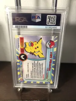 1999 Topps Pokemon TV #25 Pikachu Rainbow Foil Blue Logo PSA 7 Low Pop - Image 2