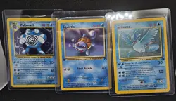 Poliwrath 13/102, Squirtle 68/82 1st Edition, Articuno 2/62 Pokemon TCG Bundle - Image 1