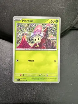 Pokemon TCG SV08: Surging Sparks Morelull 008/191 Regular NM - Image 1