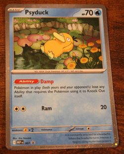 Pokemon Mega Evolution Psyduck Promo 007 - Image 1
