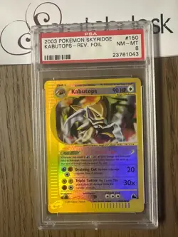 PSA 8 - Pokemon CRYSTAL KABUTOPS 150/144 - SKYRIDGE eReader - Reverse HOLO - Image 1