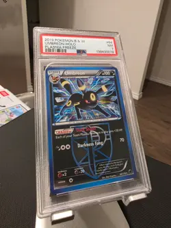 2013 Pokemon B&W Plasma Freeze UMBREON Holo #64/116 PSA 7 NM - Image 1