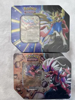 POKEMON TCG TIN LOT OF TWO (2) KORAIDON ZACIAN 10 TOTAL PACKS NEW FACTORY SEALED - Image 1