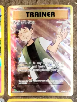 Brock's Grit (Full Art) Ultra Rare Gold Pokemon Card XY - Evolutions 107/108 - Image 1