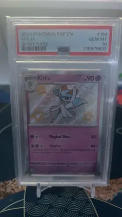 PSA 10 Pokemon TCG Kirlia Paldean Fates Baby Shiny Card 154/091 - Image 1