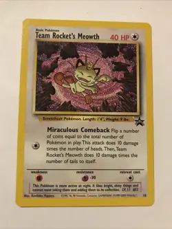 Team Rocket's Meowth Black Star Promo Pokemon Card #18 - Image 1