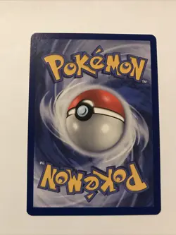 Team Rocket's Meowth Black Star Promo Pokemon Card #18 - Image 2
