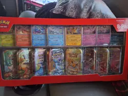 Pokemon TCG Prismatic Evolutions Tin Collection 8-Pack Booster Box - Image 1