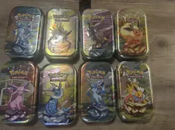 Pokemon TCG Prismatic Evolutions Lot of 8 Sealed Mini Tins - Image 1