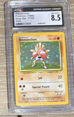 CGC 8.5 Hitmonchan 1999 Base Set 7/102 Holo Pokemon Card - Image 1