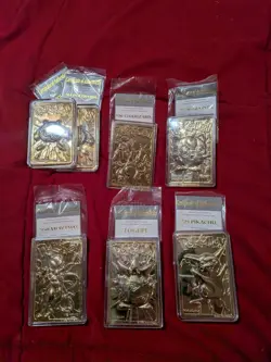 7 23k Gold Plated 1999 BK Pokemon Cards With Authenticity Cards Never Opened - Image 1