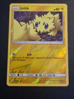 REVERSE HOLO Pokemon Sun & Moon Unified Minds TCG Card Joltik 61/236 - Image 1