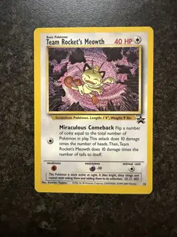 Team Rocket's Meowth Black Star Promo Pokemon Card #18 - Image 1