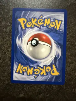 Team Rocket's Meowth Black Star Promo Pokemon Card #18 - Image 2