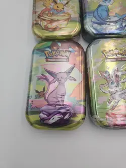 Pokemon TCG Scarlet Violet Prismatic Evolutions 8 Mini Tins NEW - Image 2