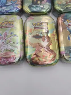 Pokemon TCG Scarlet Violet Prismatic Evolutions 8 Mini Tins NEW - Image 4