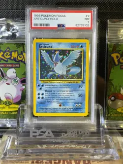 1999 POKEMON FOSSIL ARTICUNO HOLO 2/62 PSA 7 NM - Image 1