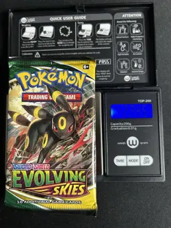 22.45 (Heavy) Evolving Skies Pokemon Booster Pack - Sealed - Image 1