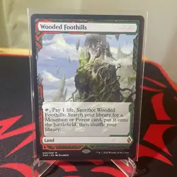 MTG Zendikar Rising Wooded Foothills 004/030 - Image 1