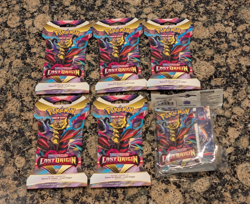 6x Pokemon Lost Origin Booster Packs (5 Sleeved and 1 portfolio pack) - Image 1