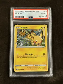PSA 8 2022 Pokemon Holiday Calendar SWSH153 Pikachu Holo Snowflake Stamp - Image 1